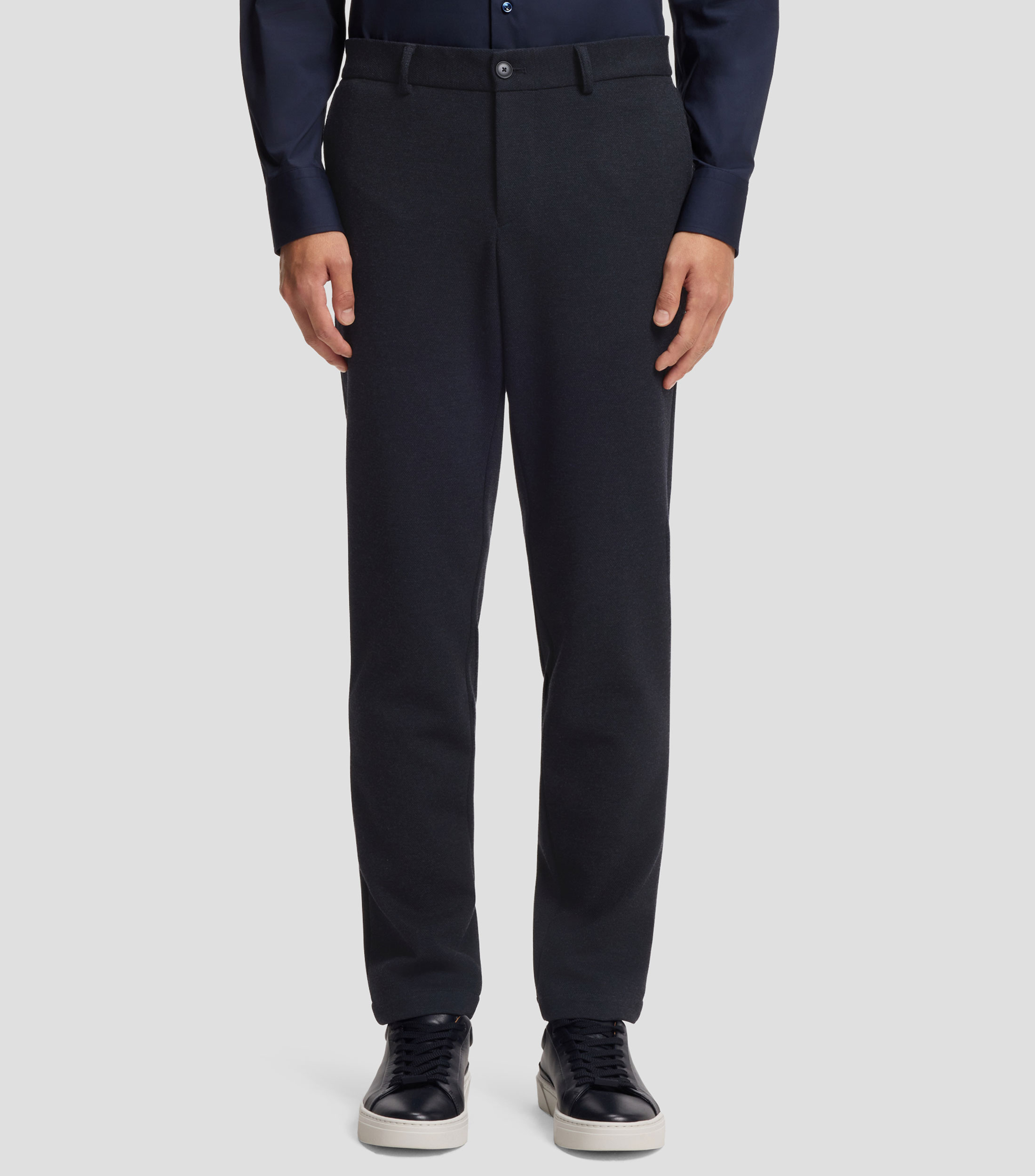 Pantalones slim fit de tejido elástico técnico Hombre